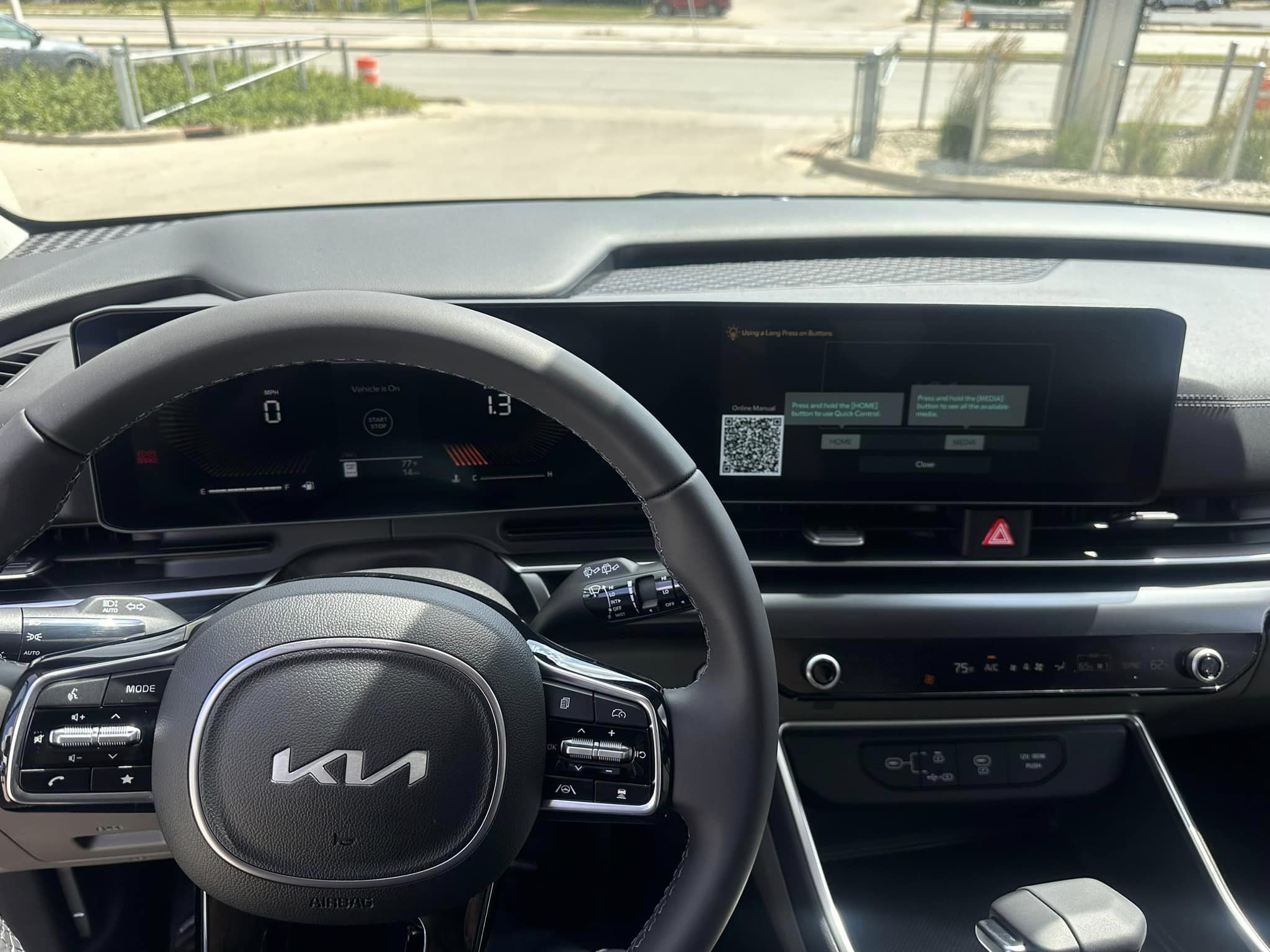 2025 Kia Carnival - LXS Trim - Flare Red with Taupe Off-Black Interior - 