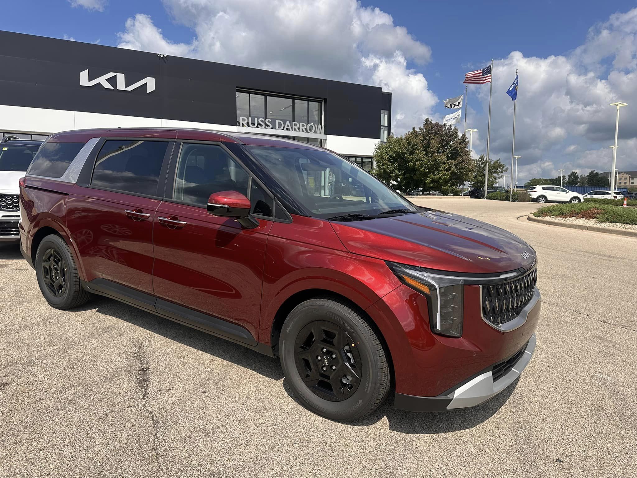 2025 Kia Carnival - LXS Trim - Flare Red with Taupe Off-Black Interior - 