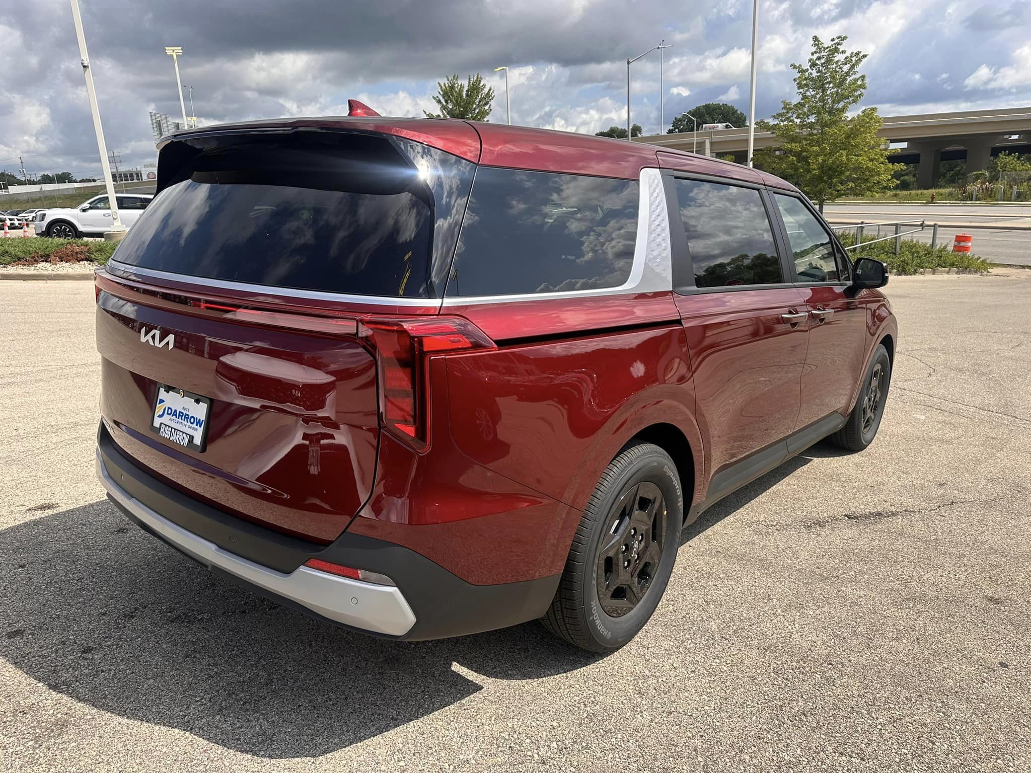 2025 Kia Carnival - LXS Trim - Flare Red with Taupe Off-Black Interior - 