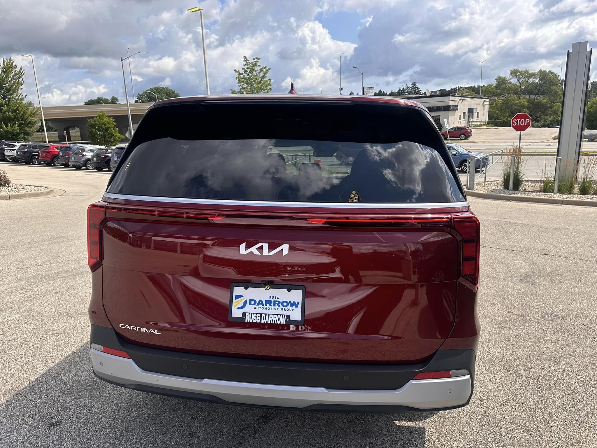 2025 Kia Carnival - LXS Trim - Flare Red with Taupe Off-Black Interior - 