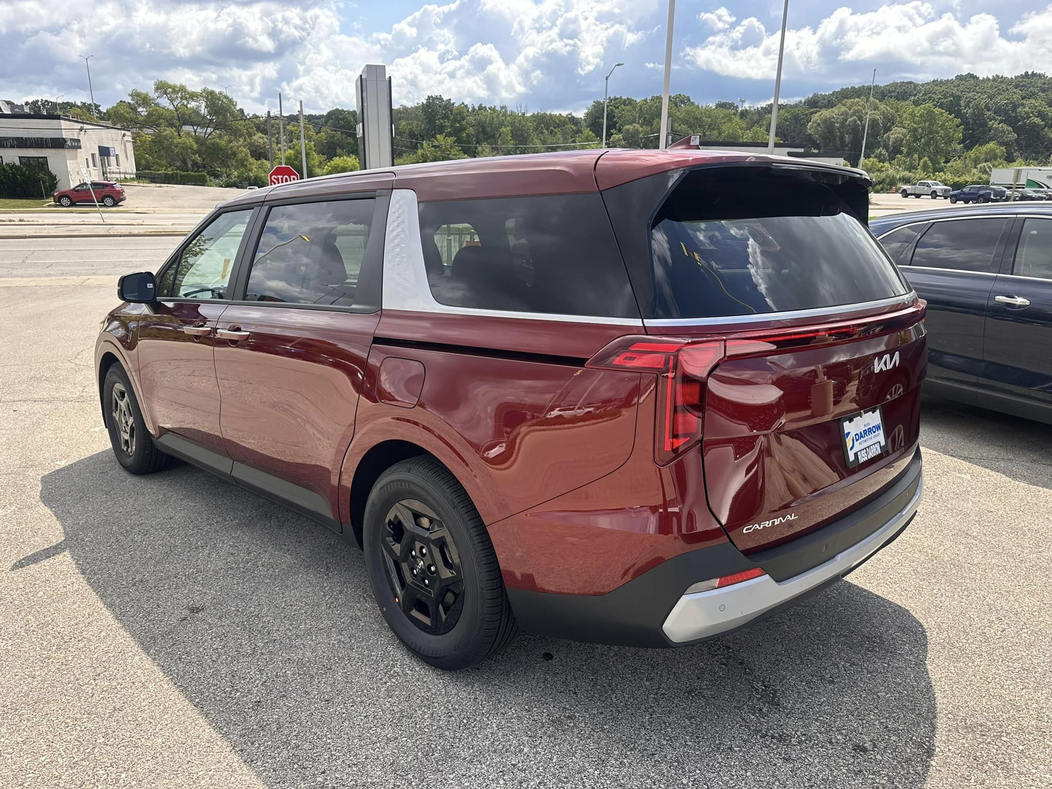 2025 Kia Carnival - LXS Trim - Flare Red with Taupe Off-Black Interior - 