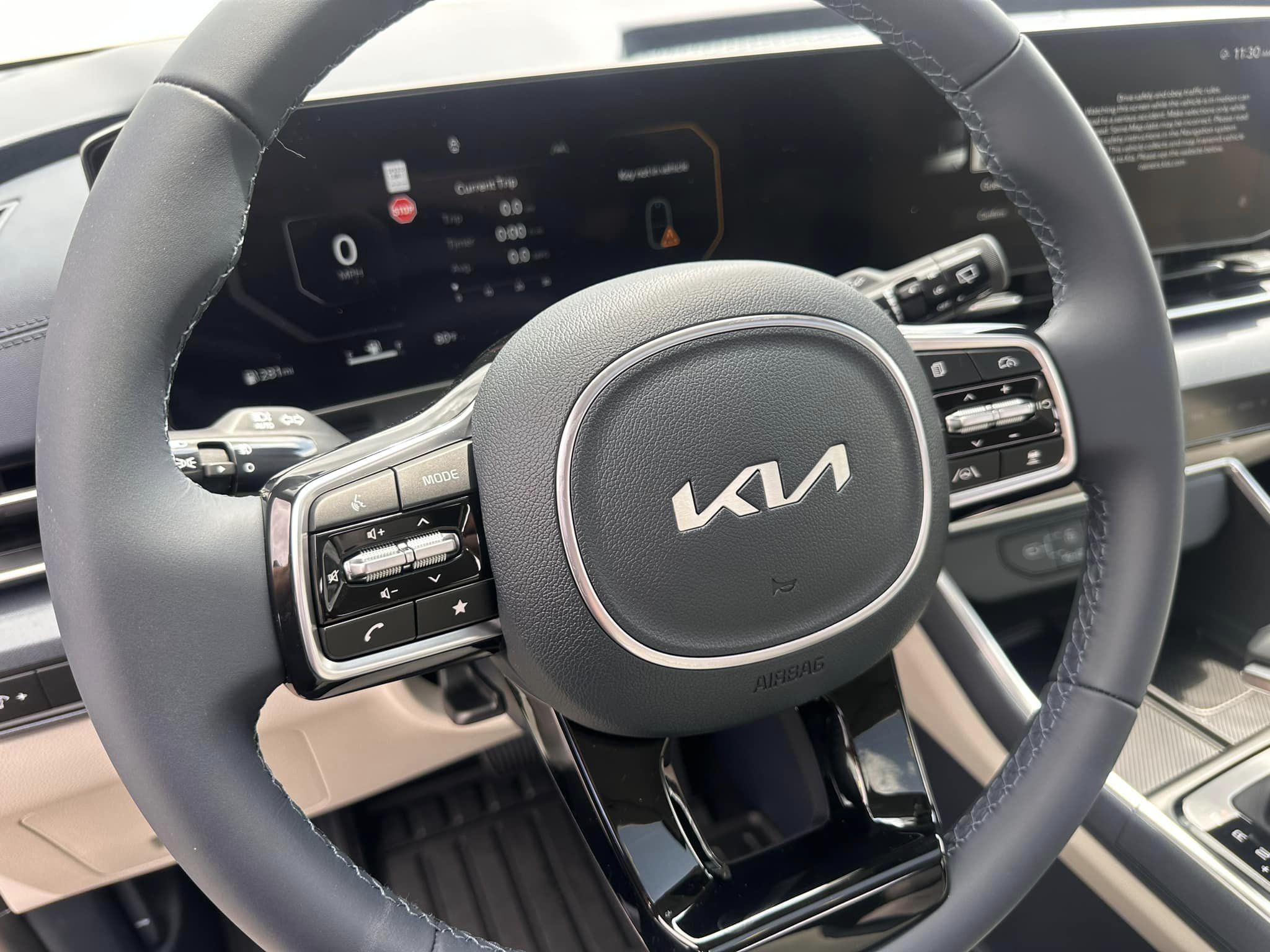 2025 Kia Carnival - SX Trim - Ceramic Silver with Navy & Gray Interior - 