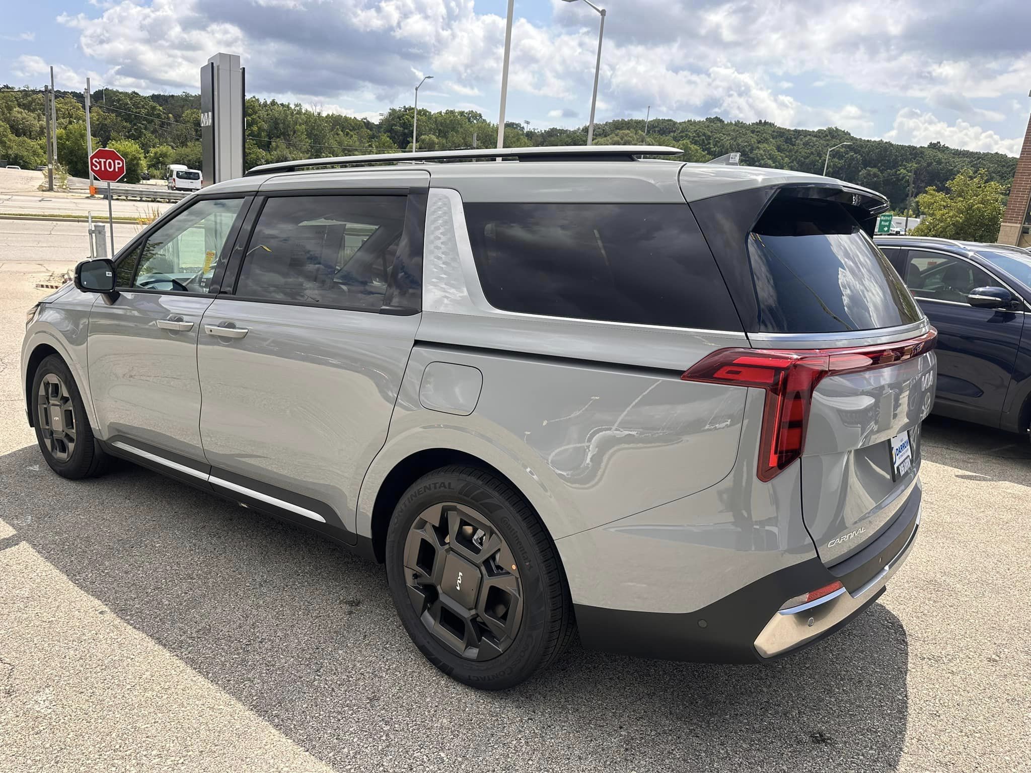 2025 Kia Carnival - SX Trim - Ceramic Silver with Navy & Gray Interior - 