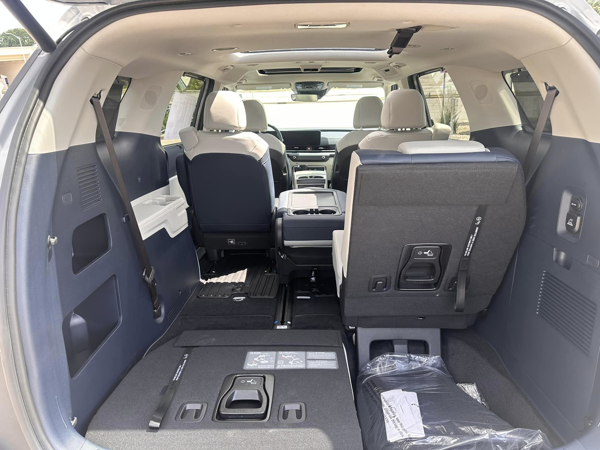 2025 Kia Carnival - SX Trim - Ceramic Silver with Navy & Gray Interior - 