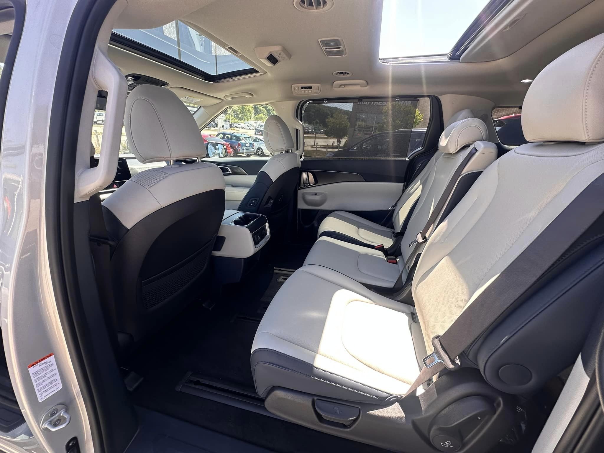 2025 Kia Carnival - SX Dark Edition Trim - Ceramic Silver with Navy & Gray Interior - 