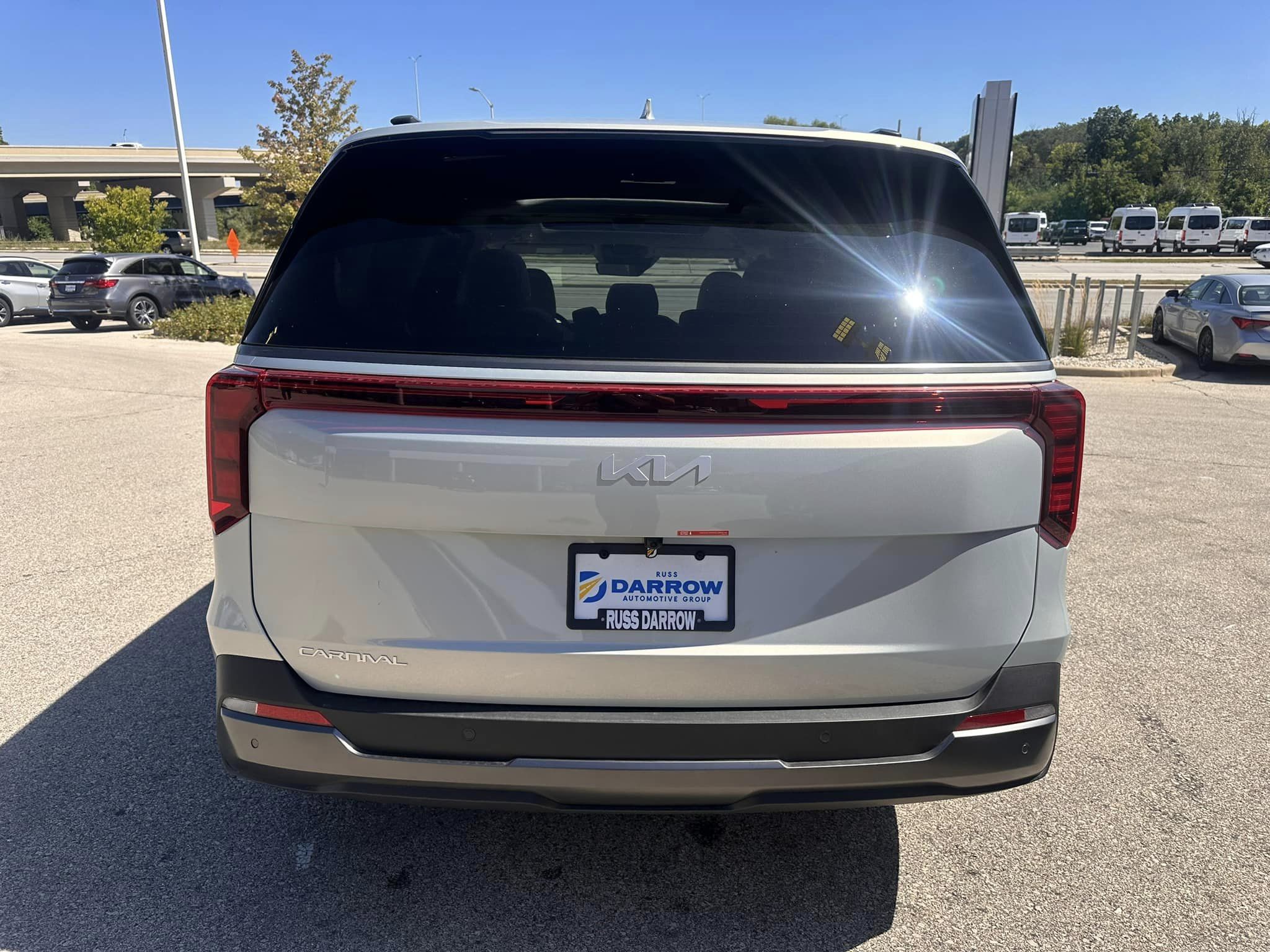 2025 Kia Carnival - SX Dark Edition Trim - Ivory Silver with Navy & Gray Interior - 