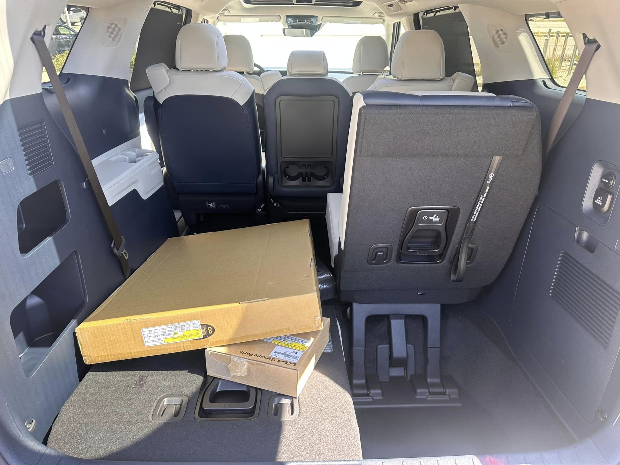 2025 Kia Carnival - SX Dark Edition Trim - Ivory Silver with Navy & Gray Interior - 