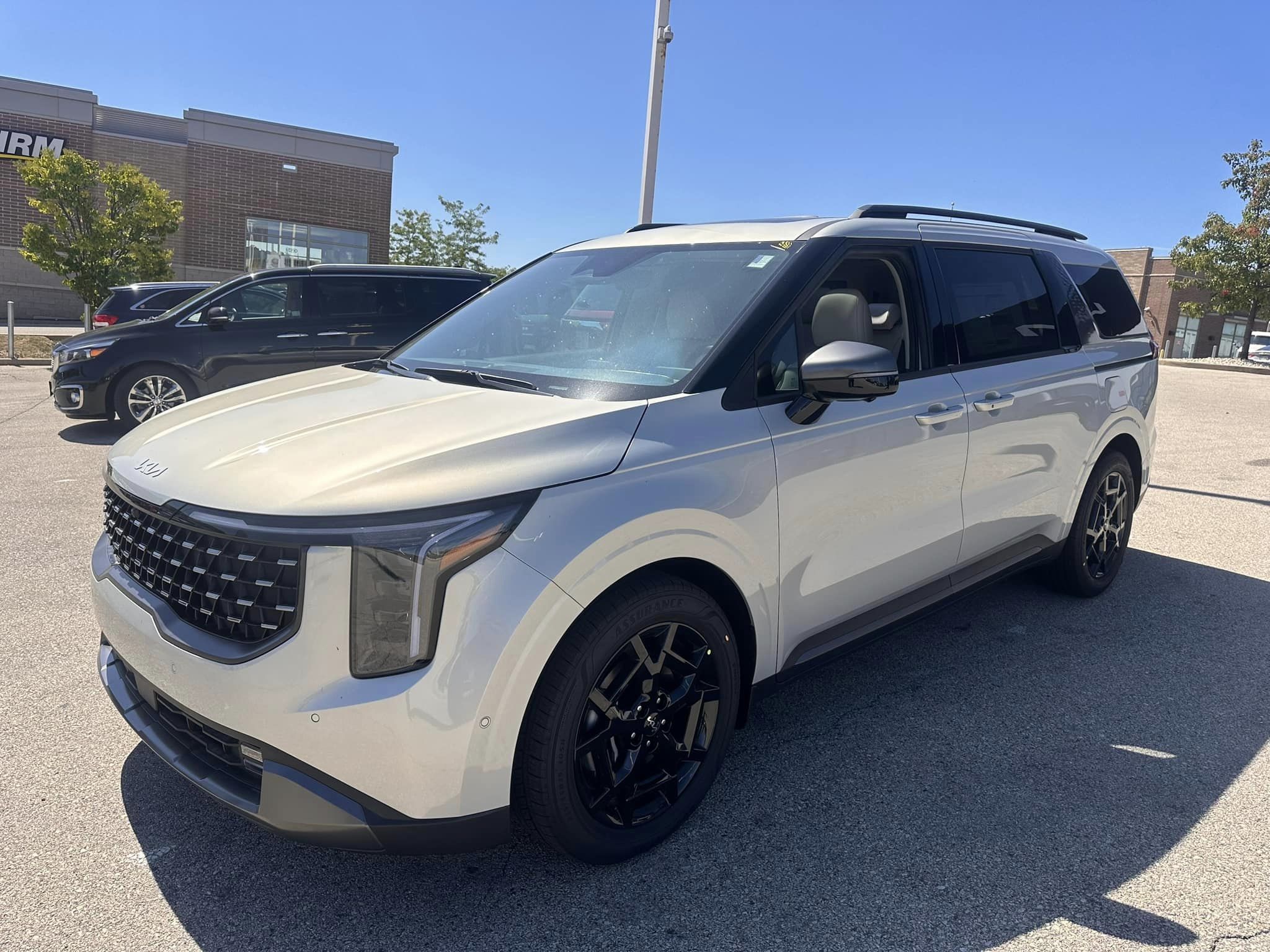 2025 Kia Carnival - SX Dark Edition Trim - Ivory Silver with Navy & Gray Interior - 